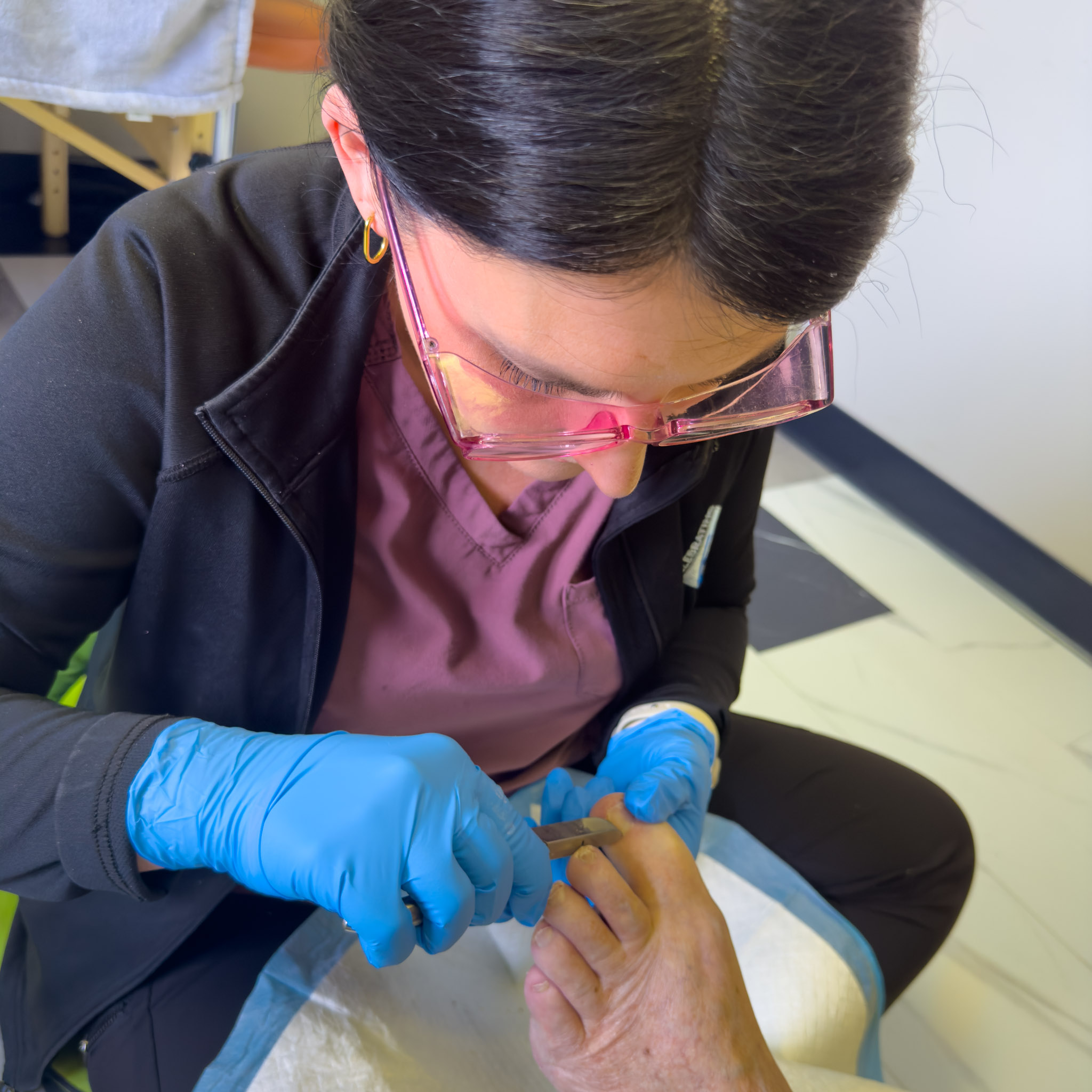 Foot Care Nurse Treating a Foot
